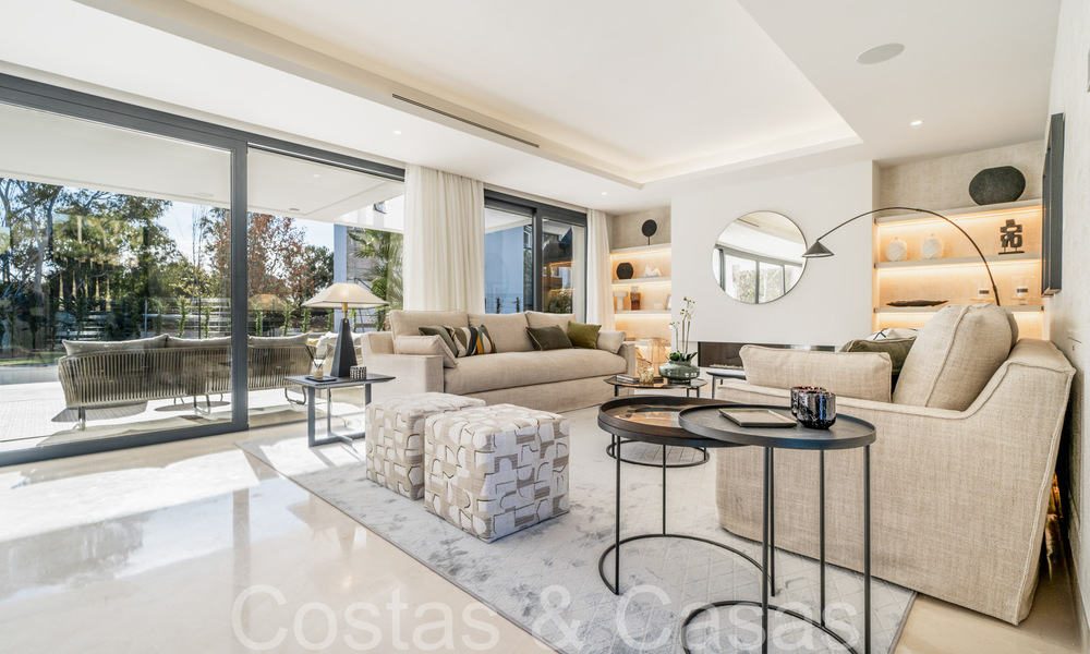 Contemporary luxury villas for sale at walking distance from a prominent golf club, on the New Golden Mile between Marbella and Estepona 69267