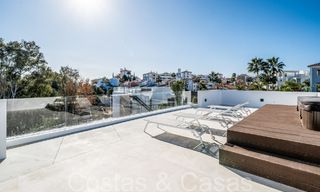 Contemporary luxury villas for sale at walking distance from a prominent golf club, on the New Golden Mile between Marbella and Estepona 69280 