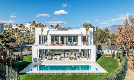 Contemporary luxury villas for sale at walking distance from a prominent golf club, on the New Golden Mile between Marbella and Estepona 69289