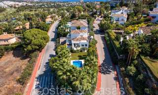 Detached Mediterranean villa for sale within walking distance of amenities overlooking the golf valley and mountain scenery in Nueva Andalucia, Marbella 68203 