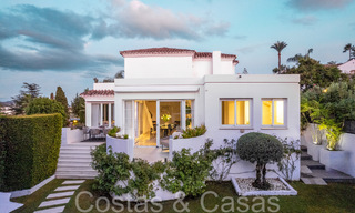 Detached Mediterranean villa for sale within walking distance of amenities overlooking the golf valley and mountain scenery in Nueva Andalucia, Marbella 68205 