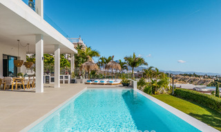 Exclusive designer villa with panoramic sea views for sale in the a five-star golf resort in Marbella - Benahavis 74766 