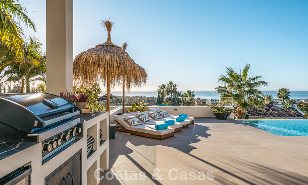 Exclusive designer villa with panoramic sea views for sale in the a five-star golf resort in Marbella - Benahavis 74777