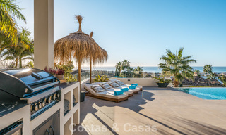 Exclusive designer villa with panoramic sea views for sale in the a five-star golf resort in Marbella - Benahavis 74777 