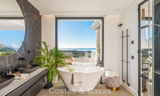 Exclusive designer villa with panoramic sea views for sale in the a five-star golf resort in Marbella - Benahavis 74782 