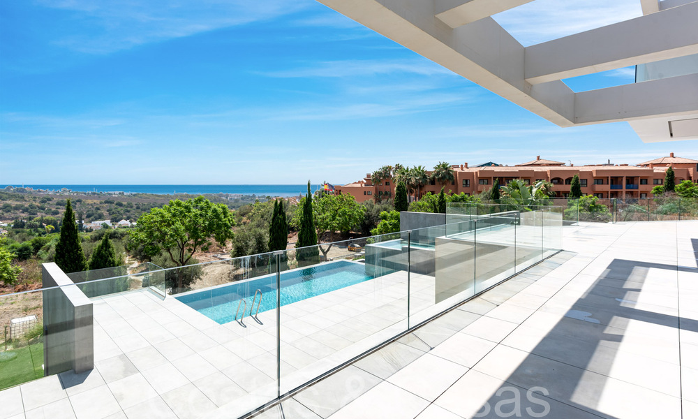 New, modernist designer villa for sale with stunning sea views in five-star golf resort in Marbella - Benahavis 68471