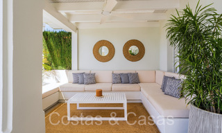 Spanish, semi-detached luxury villa with sea views for sale in the gated golf community of Santa Clara in East Marbella 67059 