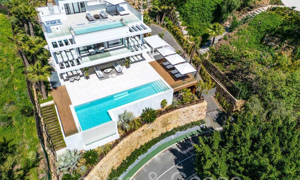 Ready to move in, modern luxury villa with unobstructed sea views for sale, located in La Quinta, Marbella - Benahavis 67780