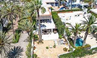 Luxury villa with open sea views for sale, right on the beach on Marbella's prestigious Golden Mile 68330 