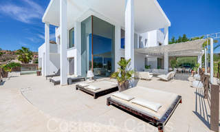 Ready to move, high-end designer villa for sale, frontline golf with sea views in Benahavis - Marbella 68417 