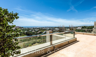 Luxurious duplex penthouse for sale with private pool and sea views in Nueva Andalucia, Marbella 68982 