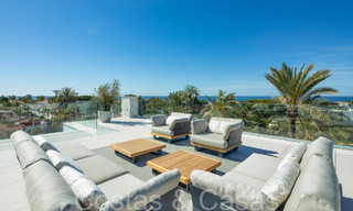 Contemporary luxury villa for sale a stone's throw from the beach in East Marbella 69048 