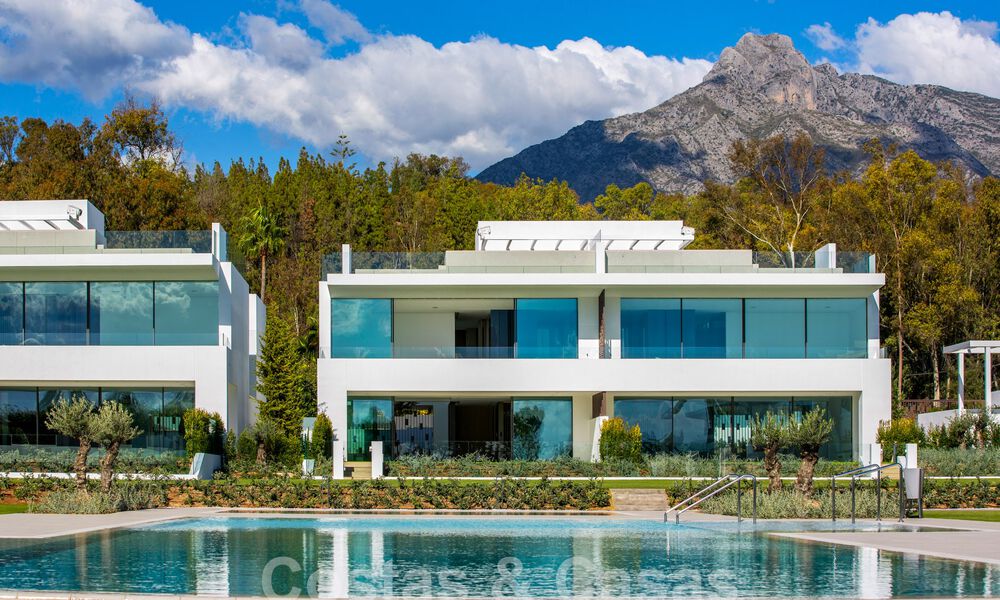 Resale! Ultra-modern designer home for sale in a prime complex on Marbella's Golden Mile. Ready to move in. 69357