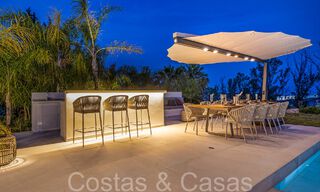 Beautiful renovated villa in contemporary Mediterranean style for sale, adjacent to the golf course in Benahavis - Marbella 69136 