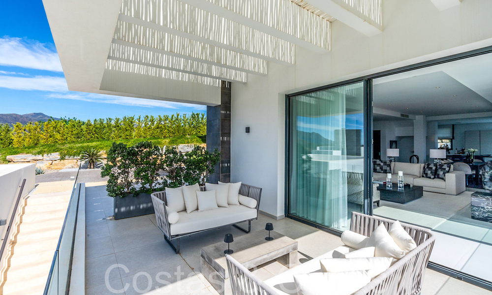 Ready to move luxury villa with panoramic views for sale in a gated community of Benahavis - Marbella 70051