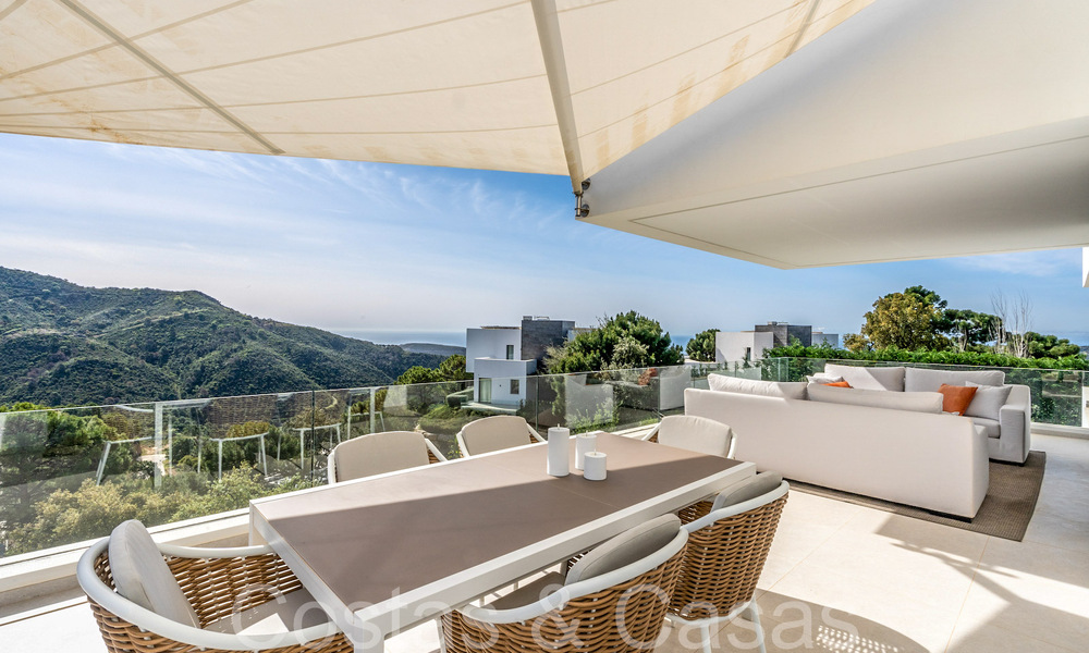 Ready to move luxury villa with panoramic views for sale in a gated community of Benahavis - Marbella 70056