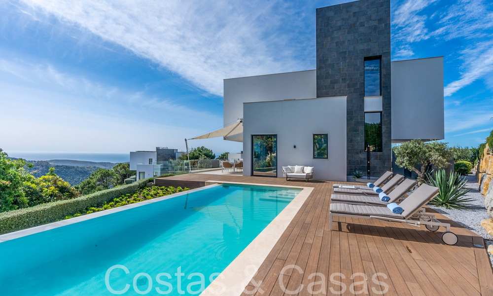 Ready to move luxury villa with panoramic views for sale in a gated community of Benahavis - Marbella 70064