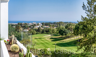 Luxuriously renovated apartment with golf and sea views for sale, adjacent to a premier golf course in La Quinta, Benahavis - Marbella 69947 