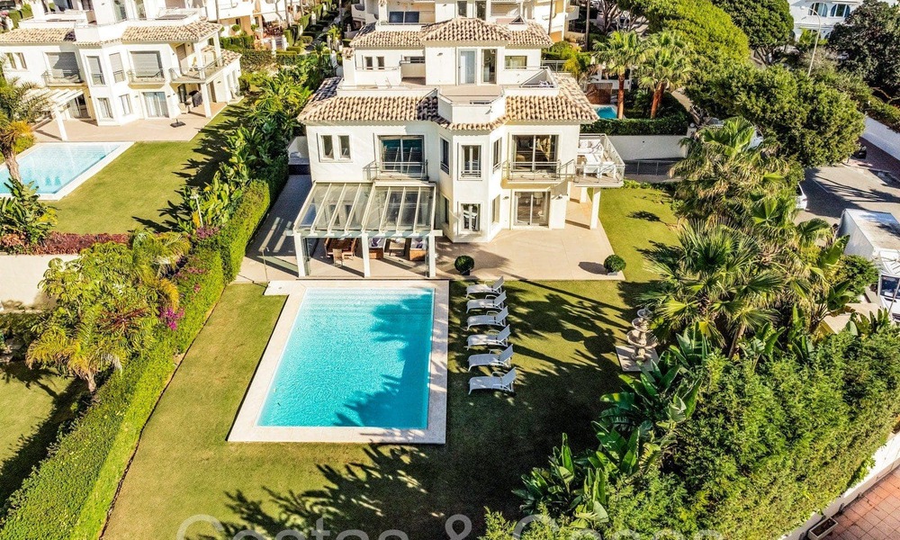 Spacious villa with Andalusian charm for sale, first line beach east of Marbella centre 70286