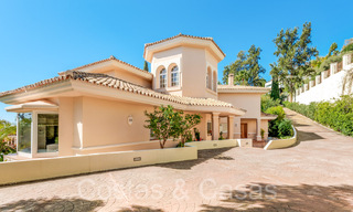 Luxurious villa with traditional architectural style for sale in a gated community of La Quinta, Benahavis - Marbella 70312 