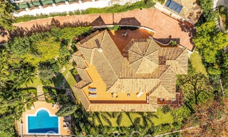 Luxurious villa with traditional architectural style for sale in a gated community of La Quinta, Benahavis - Marbella 70317 