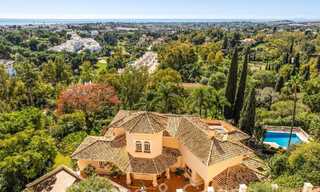 Luxurious villa with traditional architectural style for sale in a gated community of La Quinta, Benahavis - Marbella 70318 