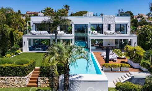 Award-winning designer villa with modern architecture for sale just steps from the beach in East Marbella 70340