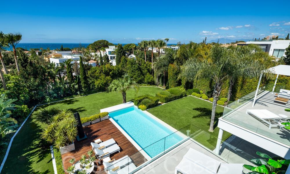 Award-winning designer villa with modern architecture for sale just steps from the beach in East Marbella 70348