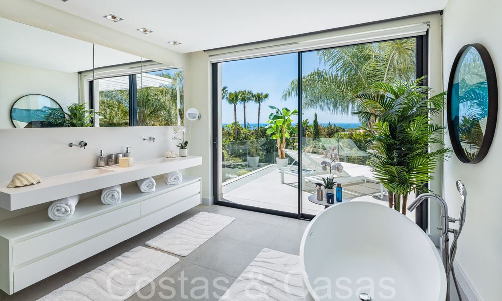 Award-winning designer villa with modern architecture for sale just steps from the beach in East Marbella 70353