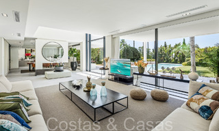 Award-winning designer villa with modern architecture for sale just steps from the beach in East Marbella 70360 