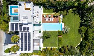 Award-winning designer villa with modern architecture for sale just steps from the beach in East Marbella 70372 