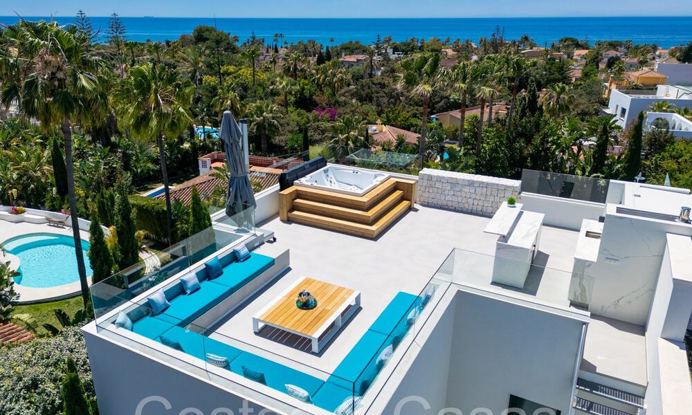 Award-winning designer villa with modern architecture for sale just steps from the beach in East Marbella 70375