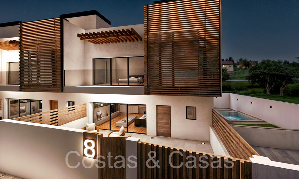 New development of 8 townhouses for sale adjacent to the golf course in Estepona 70541