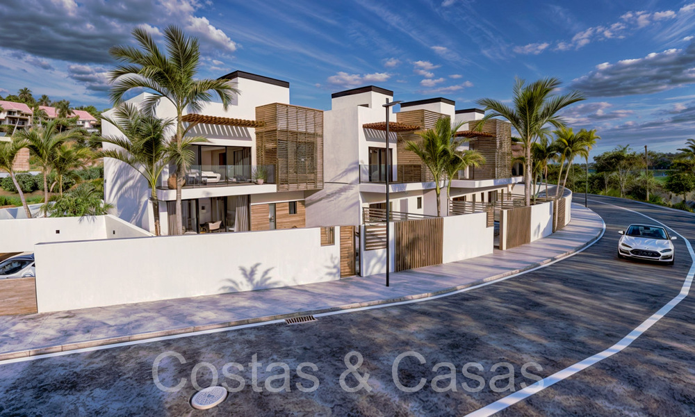 New development of 8 townhouses for sale adjacent to the golf course in Estepona 70545