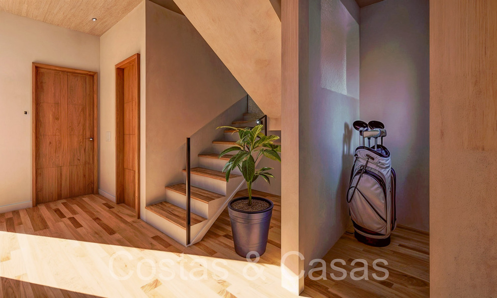 New development of 8 townhouses for sale adjacent to the golf course in Estepona 70548