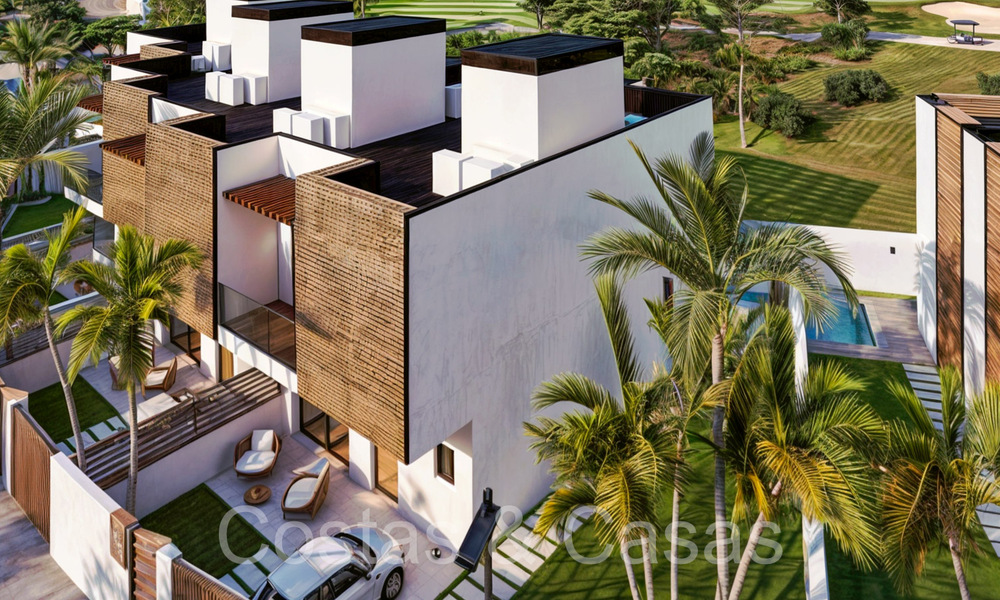 New development of 8 townhouses for sale adjacent to the golf course in Estepona 70560