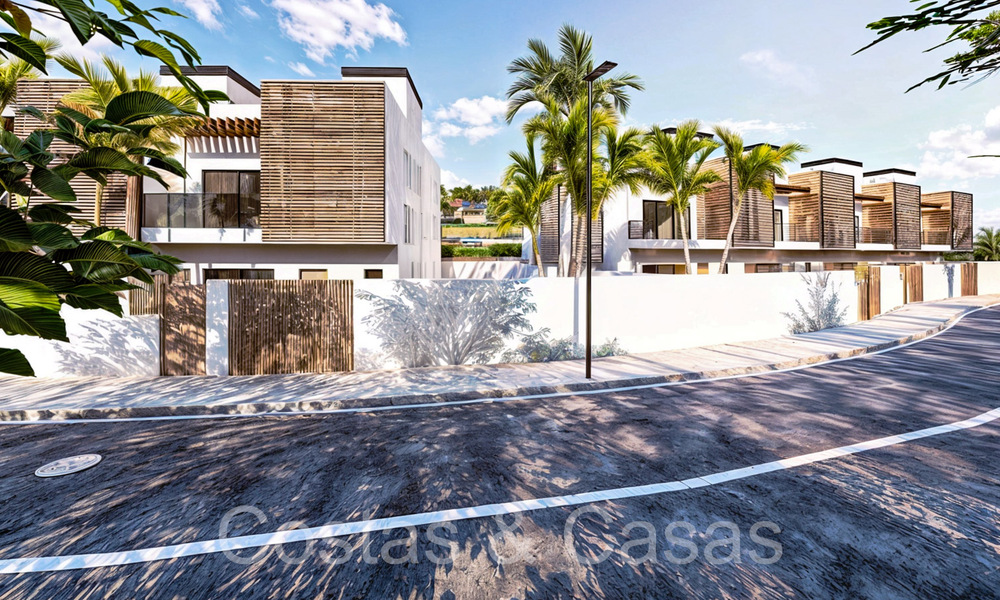 New development of 8 townhouses for sale adjacent to the golf course in Estepona 70565