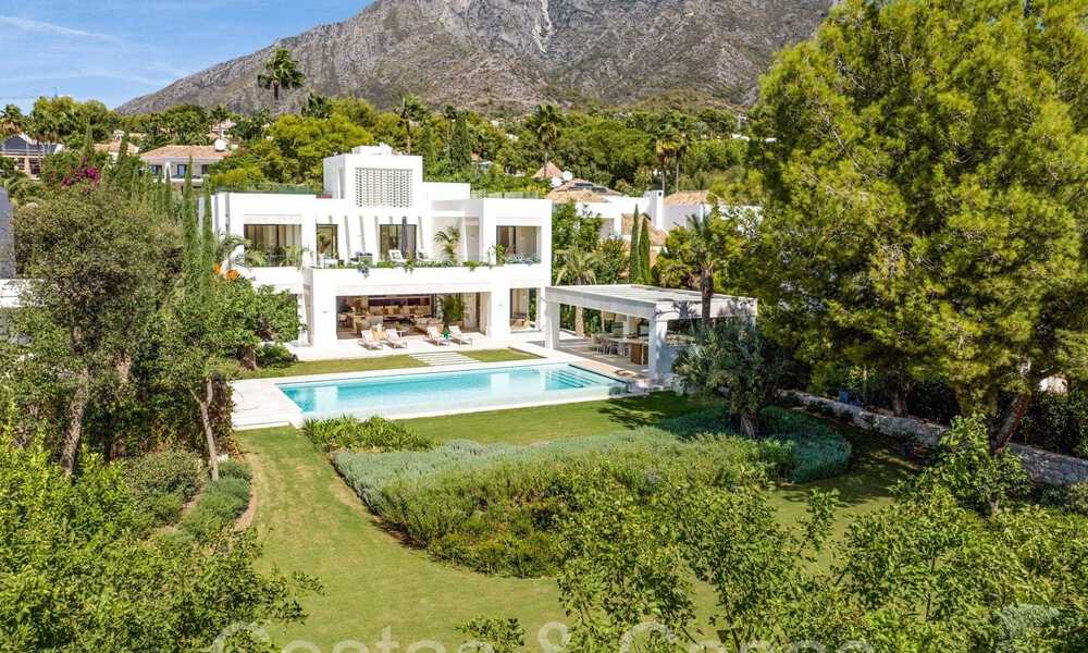 Modern luxury villa for sale in a gated urbanization on Marbella's Golden Mile 70769