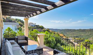 Timeless Spanish luxury villa with panoramic sea views for sale in a gated urbanization of Marbella - Benahavis 71577 