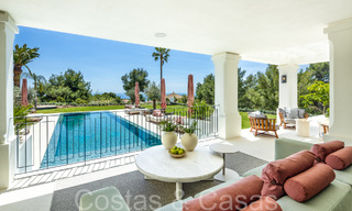 Stately luxury villa for sale in a Mediterranean style in the upscale residential area of Sierra Blanca on Marbella's Golden Mile 71615 