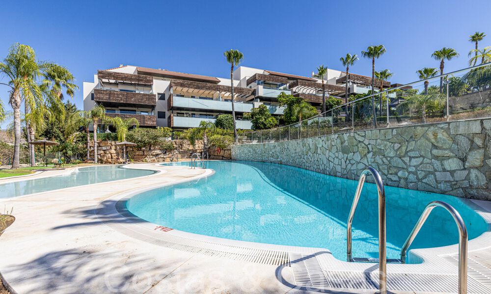 Modern golf apartment for sale in the prestigious 5* Los Flamingos Golf Resort on the New Golden Mile, Marbella - Benahavís 71684