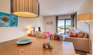 Modern golf apartment for sale in the prestigious 5* Los Flamingos Golf Resort on the New Golden Mile, Marbella - Benahavís 71730 