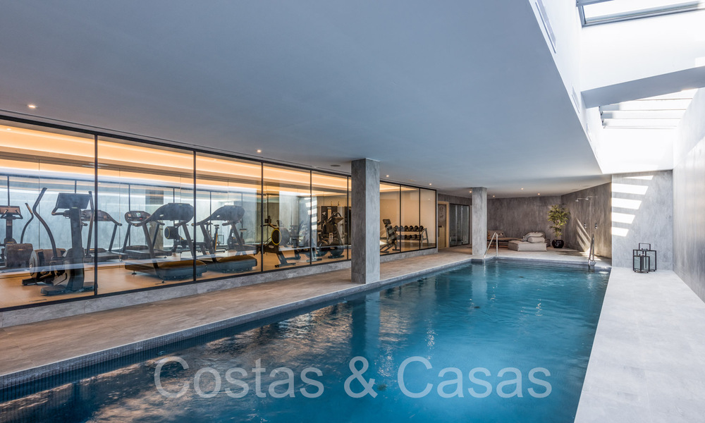 Stylish contemporary luxury Mediterranean penthouse for sale with unobstructed panoramic views in Nueva Andalucia, Marbella 72111