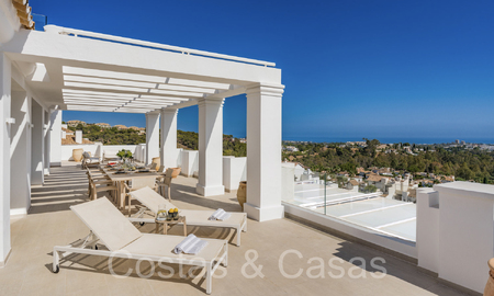 Stylish contemporary luxury Mediterranean penthouse for sale with unobstructed panoramic views in Nueva Andalucia, Marbella 72112