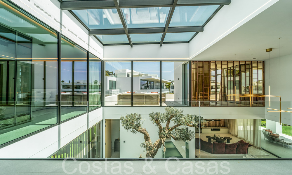 Sophisticated designer villa for sale near the beach in the heart of Marbella’s Golden Mile 72010