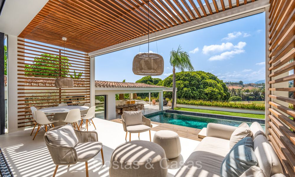 Stylishly renovated luxury villa for sale, bordering the golf course in Nueva Andalucia, Marbella 72325