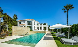 Stately luxury villa with modern Mediterranean architecture for sale in the prestigious residential area of Sierra Blanca in Marbella 72443 