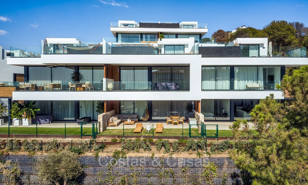 Move-in ready, modern, elegant garden apartment with private garden and sea views for sale in Marbella East 72713