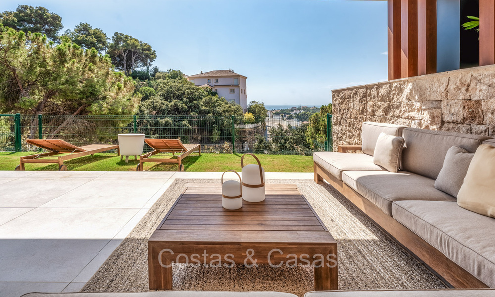 Move-in ready, modern, elegant garden apartment with private garden and sea views for sale in Marbella East 72732