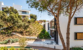 Move-in ready, modern, elegant garden apartment with private garden and sea views for sale in Marbella East 72741 